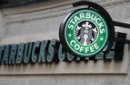 A sign is seen outside a Starbucks Coffee shop in central London