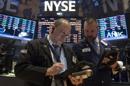 Traders work on the floor of the New York Stock Exchange