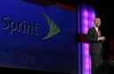 Dan Hesse, president and CEO of Sprint Nextel, speaks during a keynote address at the CTIA Wireless convention in Las Vegas, Nevada April 1, 2008. (Steve Marcus/Reuters)